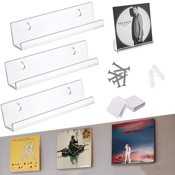 A set of clear acrylic floating display racks and individual acrylic pieces for presentation.