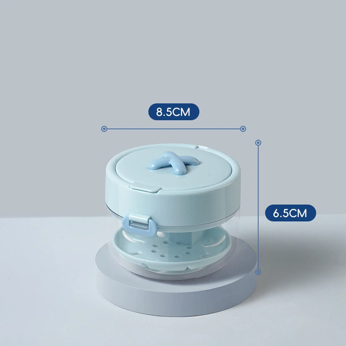 A light blue portable multi-tool organizer with a lid and base, showing dimensions of 8.5cm and 6.5cm.