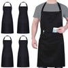 A person is wearing a black water-resistant bib apron with pockets.