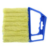 A yellow multi-functional cleaning brush with a blue handle is shown.