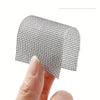 Roll of black window screen repair tape being held by a hand