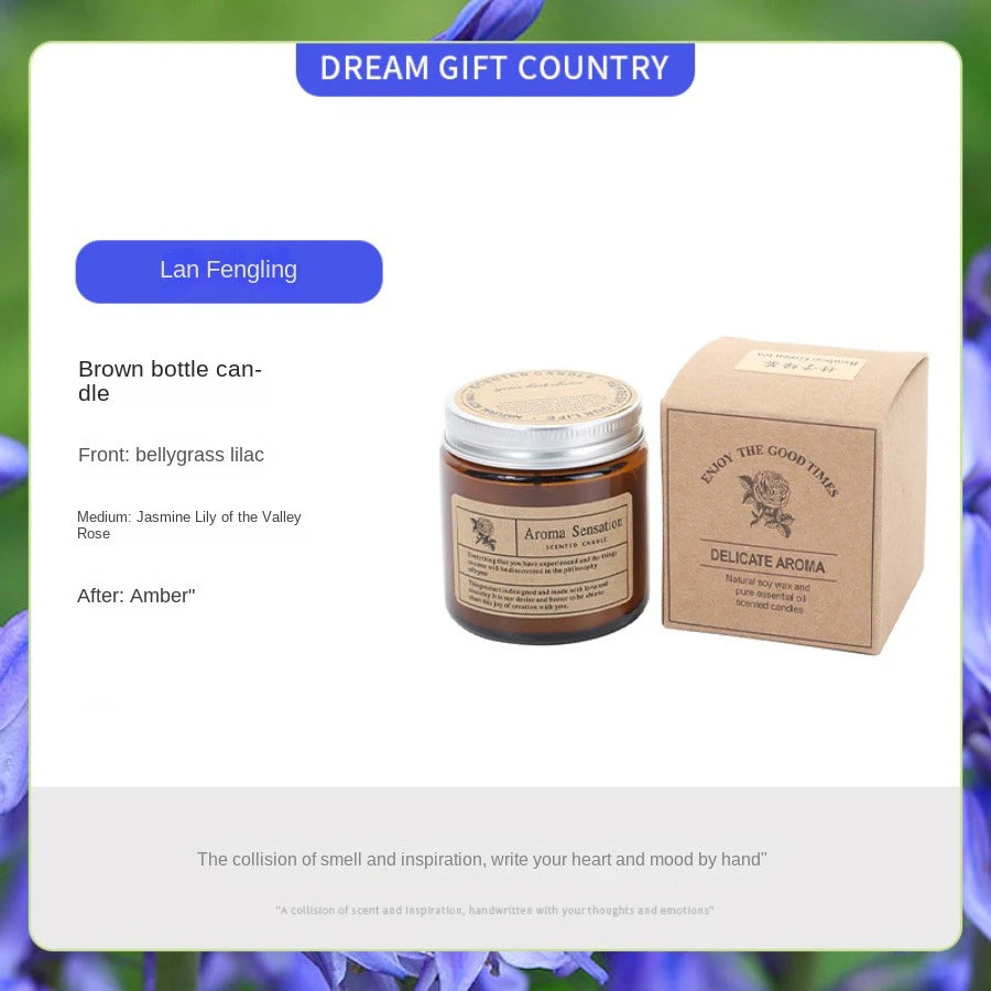 A brown aromatherapy soy wax candle in a glass jar next to its packaging box