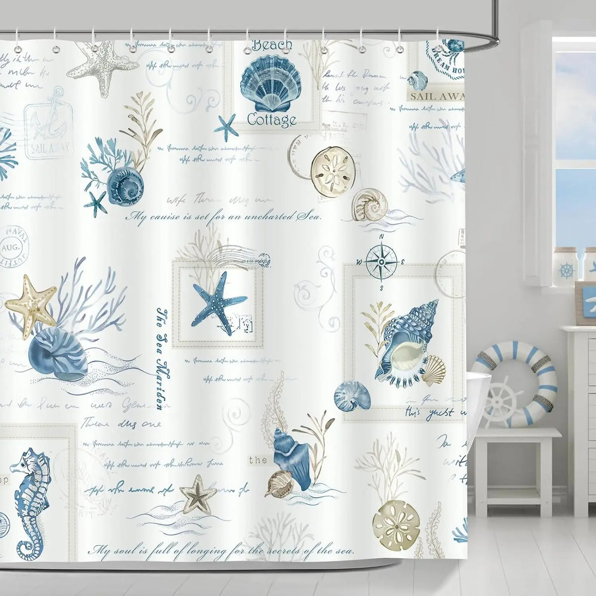 A white shower curtain featuring a nautical design with blue starfish, seashells, and sea motifs.