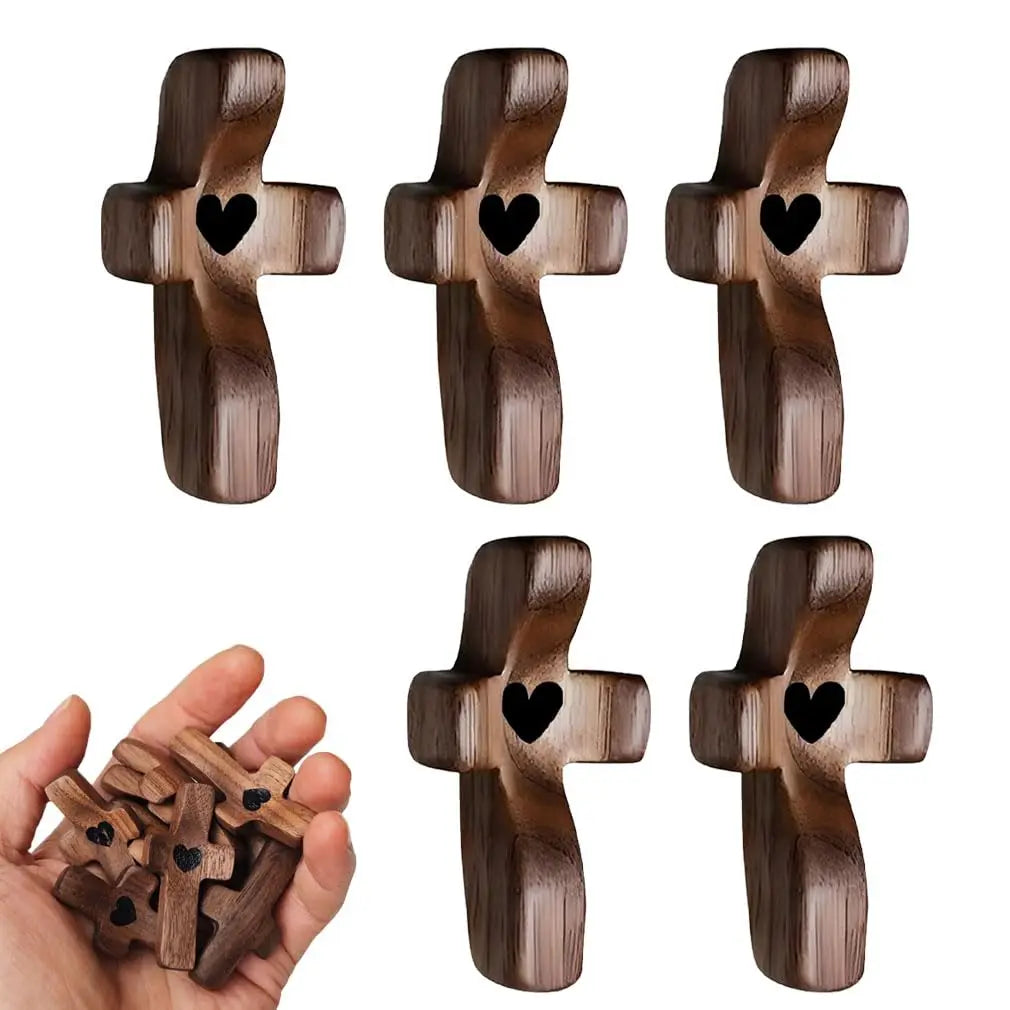 A set of handcrafted wooden pocket crosses for stress relief, showing various designs and sizes.