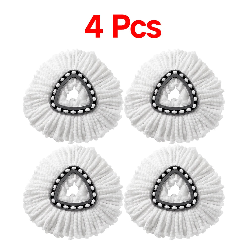 Four white microfiber replacement mop heads with a textured, circular design.