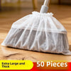 A white disposable broom cover made of sheer fabric is shown resting on a wooden floor.