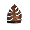 A dark brown wooden wall art frame shaped like a monstera leaf.