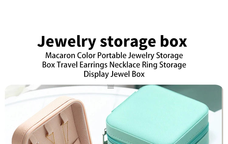 A light pink portable PU leather jewelry storage box shown in a close-up view.