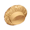 A golden satin hair bonnet with a gathered, ruffled top.