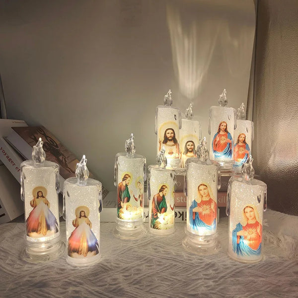 A collection of flameless LED devotional prayer candles featuring religious figures like the Virgin Mary and Jesus.