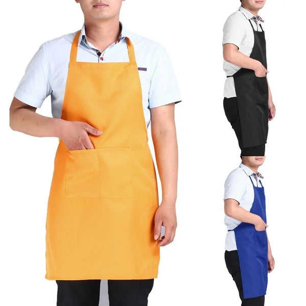 A man wearing a bright orange waterproof apron over a white shirt.