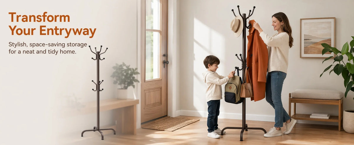 A woman hangs an orange coat on a freestanding metal coat rack with hooks in a bright entryway.