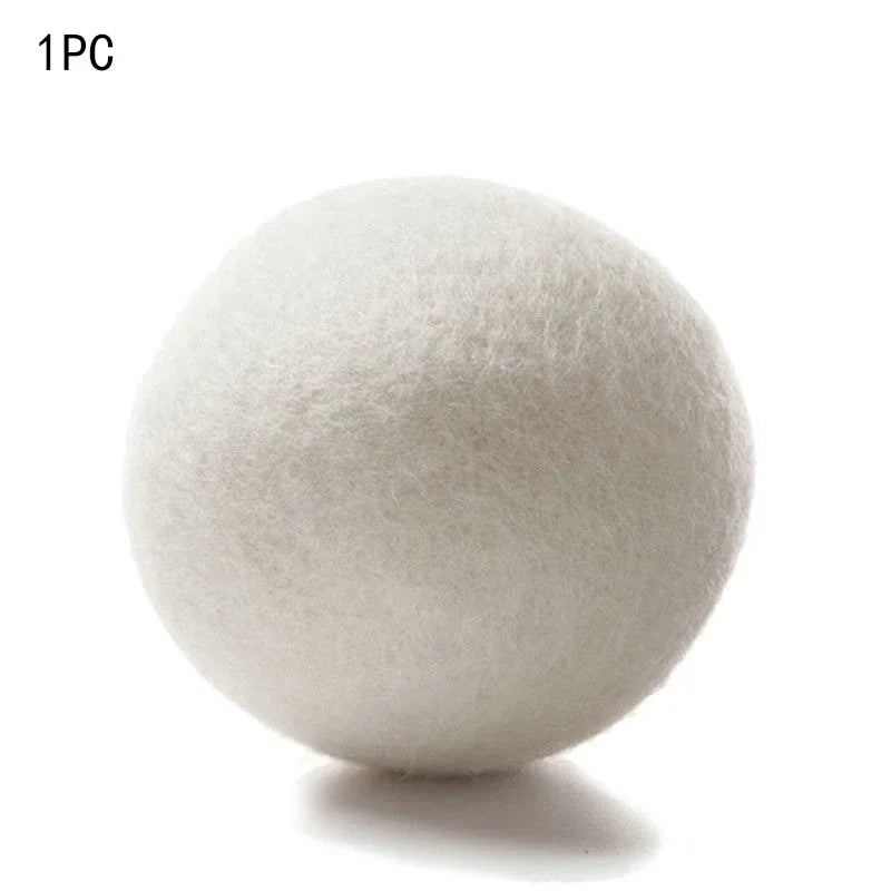 One reusable white wool dryer ball used for clothes drying.