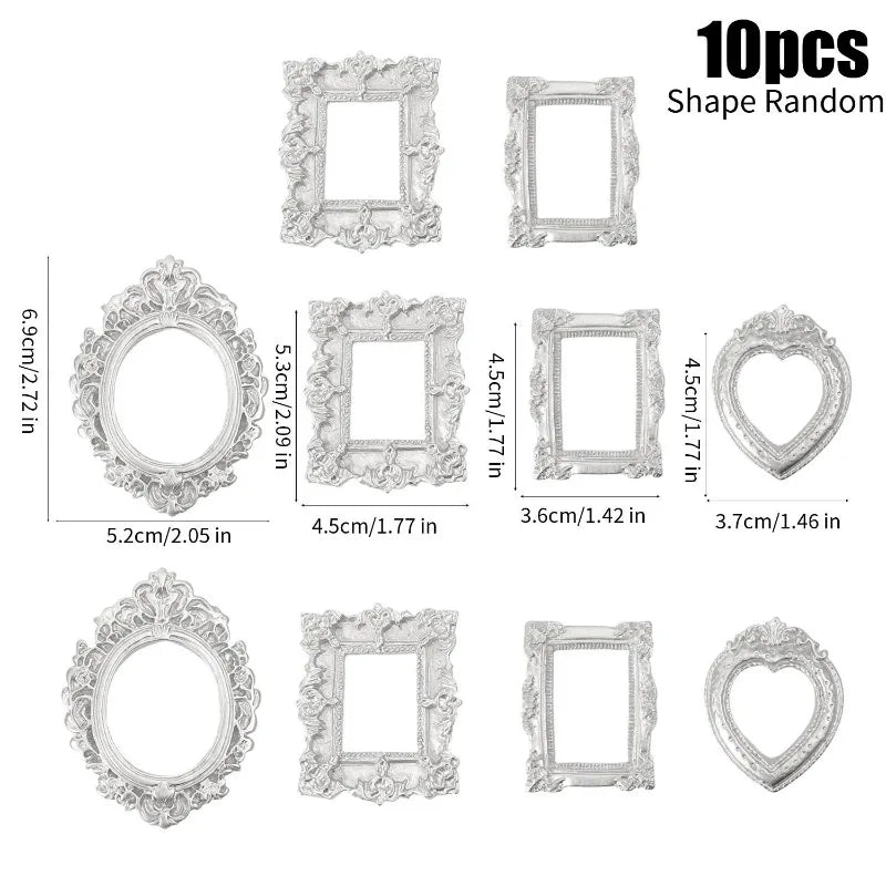 Ten pieces of random vintage style decorative photo frames with ornate silver-colored borders