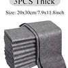 A stack of three thick gray microfiber cleaning cloths, measuring 20x30cm.