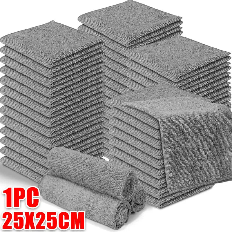 A stack of gray microfiber cleaning cloths, packaged as 1 piece, measuring 25x25cm.