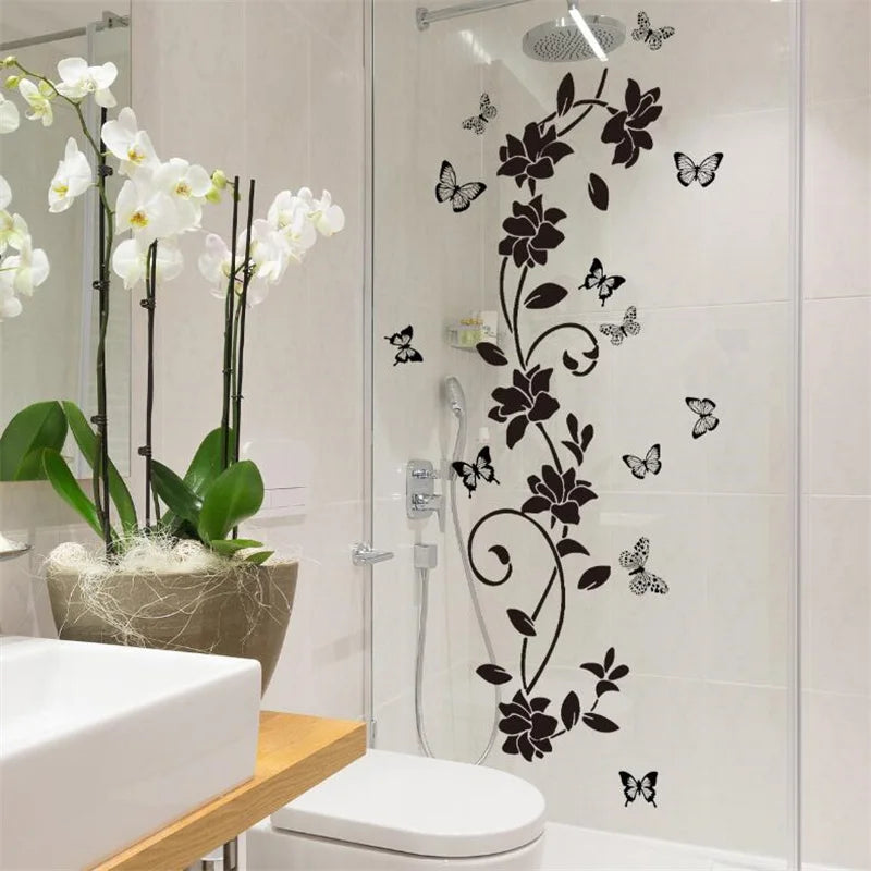 Decorative flower butterfly wall stickers on a glass shower door