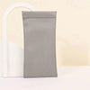 A rectangular gray PU leather squeeze eyeglasses case with a soft lining is shown against a light background.