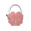 Silver foldable handbag hook with a pink flower design.