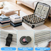 A portable vacuum compression travel bag with sealing strips and rubber stoppers shown next to stacked towels.