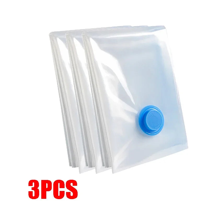 Three clear vacuum storage bags with blue hand pumps for compressing clothes and blankets
