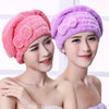 Two women modeling fluffy pink and purple microfiber hair drying towel caps