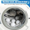 Reusable silicone laundry balls inside a washing machine drum