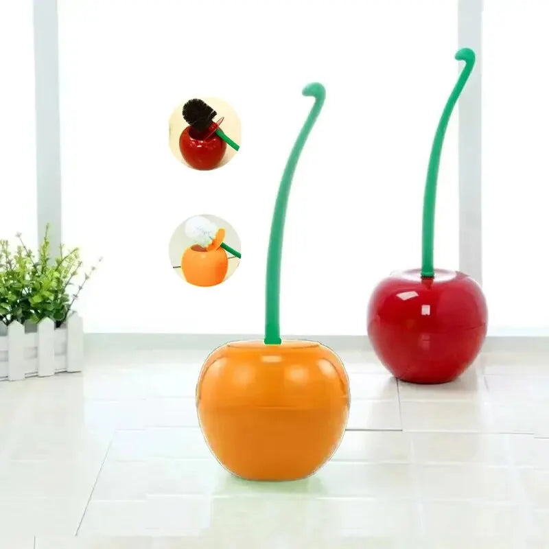 A set of decorative cherry-shaped toilet brushes in red and orange colors.