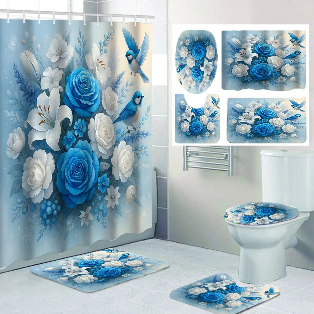 A set of four blue and white floral shower and bathroom decor pieces featuring roses and birds.