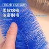 A hand is holding a thick, soft blue cleaning brush with fine bristles.