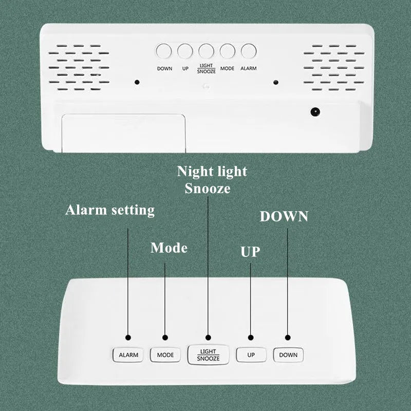A white digital alarm clock device showing various function buttons including Alarm, Mode, Light Snooze, Up, and Down.