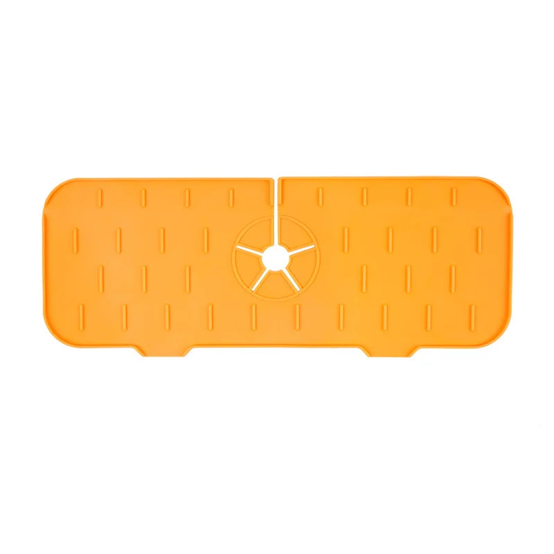 Orange silicone faucet splash guard mat with a central drain hole for kitchen or bathroom use