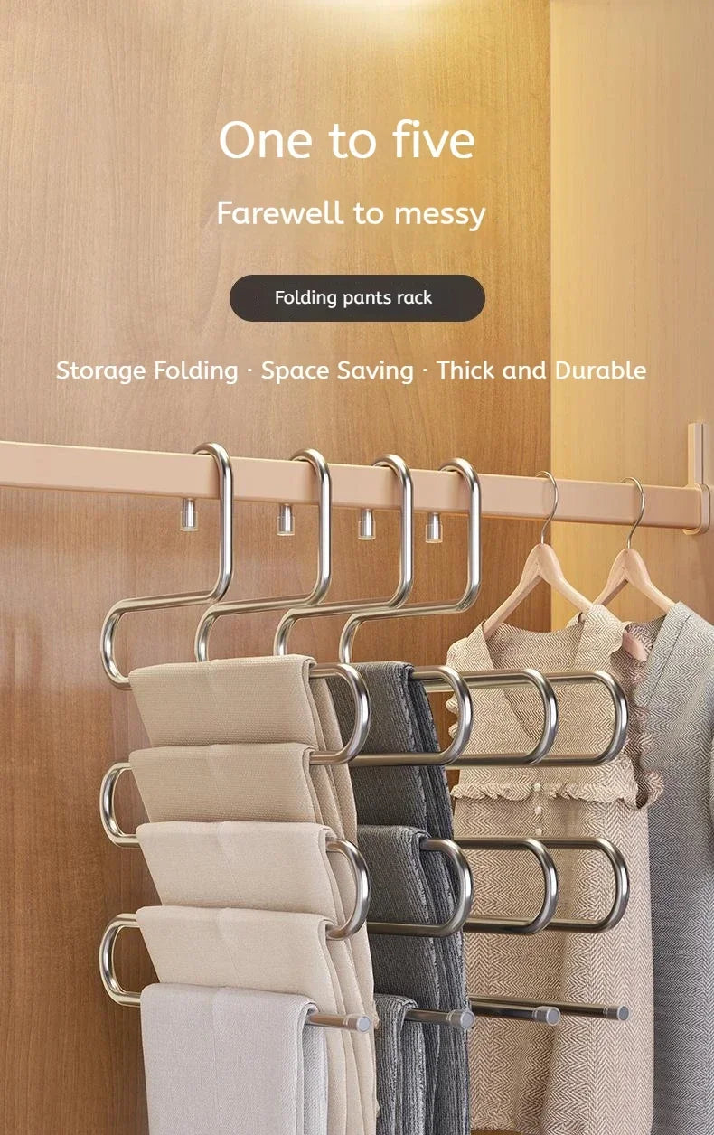 A multi-layer stainless steel clothes rack with hangers and folding pants rack for storage.