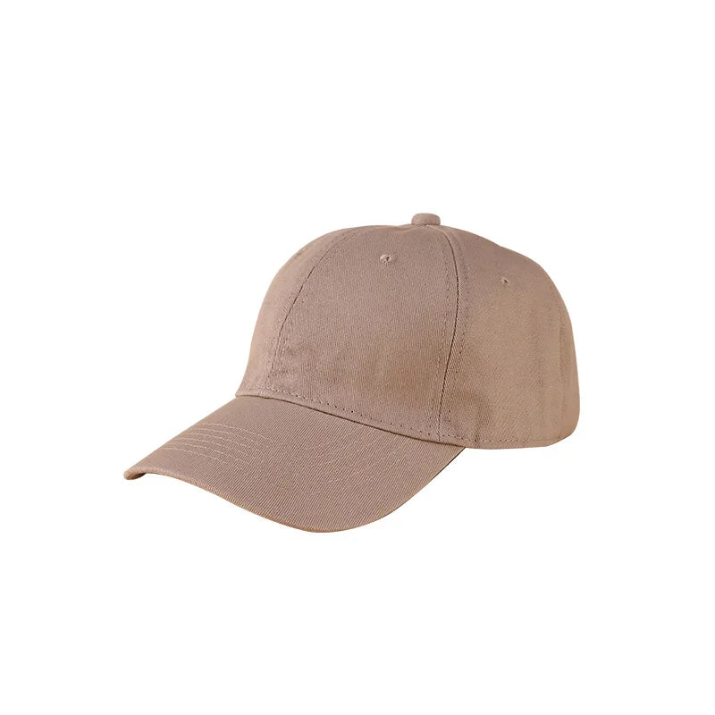 A beige cotton baseball cap shown from the side.