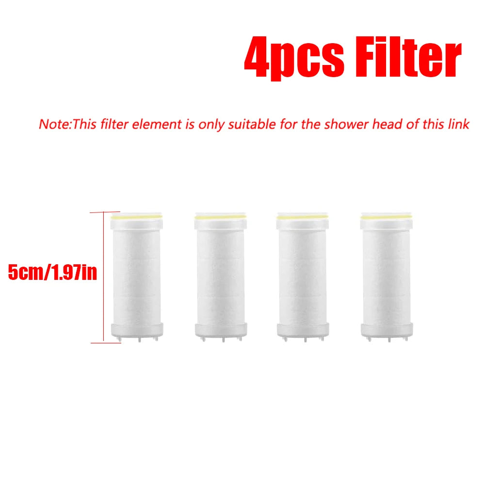 Four white filter elements for a shower head, measuring 5cm long.