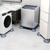 A silver washing machine and a dryer are shown on a tiled floor with anti-vibration pads underneath.