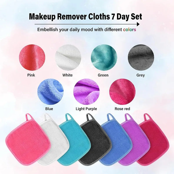 A set of seven colorful reusable makeup remover cloths in various shades including pink, white, green, grey, blue, purple, an
