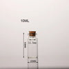 Flacon en verre transparent avec bouchon de liège, étiqueté 10ML et mesurant 50MM de hauteur.