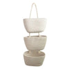 Handwoven multi-layer wall storage basket in natural beige color