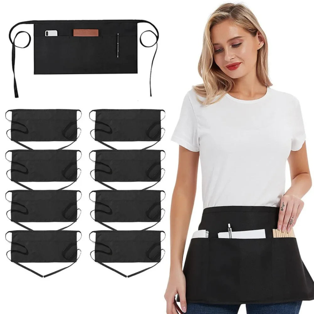 A woman models a black fashion chef short apron with pockets, showing various folded versions of the apron.