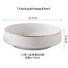 A white ceramic rimmed bowl with a gold rim, measuring 7.5 inches and having a capacity of about 700ml.