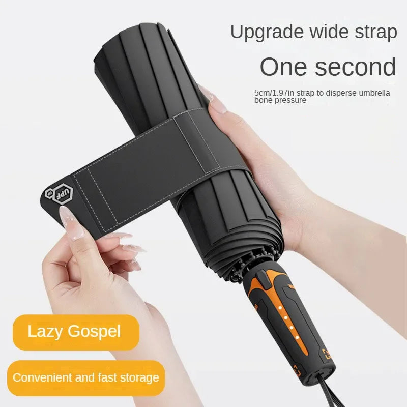 A hand is applying a wide strap to a black umbrella, demonstrating an upgrade feature for dispersing bone pressure.