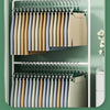 A display of stainless steel adjustable clothing hangers in various neutral and muted earth tones.