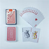 A collection of playing cards including a standard deck, a joker card, and a fan of cards showing the Ace through King.