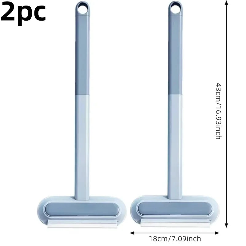 A pair of light blue reusable multi-surface pet hair remover tools shown vertically and horizontally.