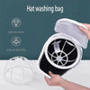 A hand is opening a white reusable laundry bag designed for hat washing, showing the mesh interior.