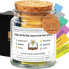 A glass jar filled with yellow Bible verses and a wooden lid, labeled for devotion and gratitude.