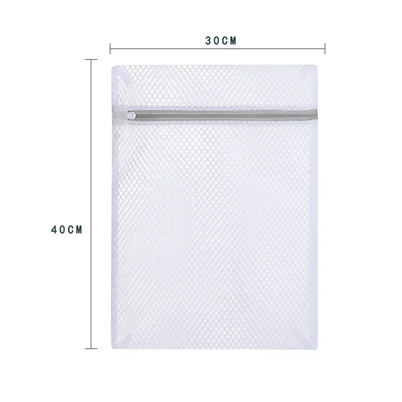 A white reusable honeycomb mesh laundry bag with a silver zipper, shown flat.