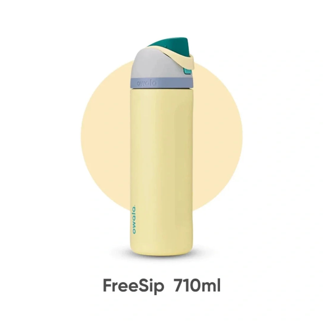 A light yellow insulated water bottle with a teal cap and straw, shown vertically.