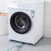 A white washing machine with a large circular door is shown, resting on anti-vibration feet.